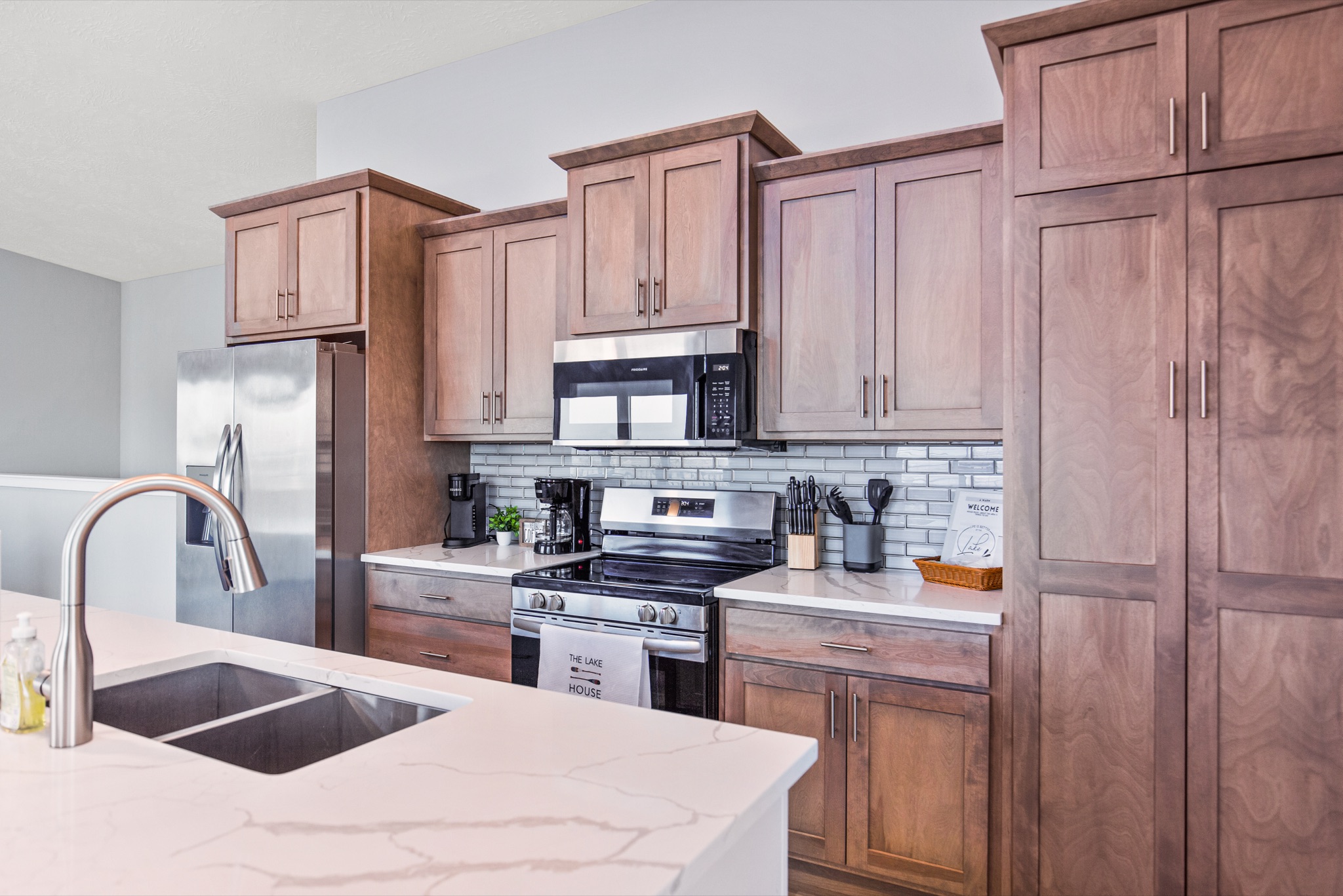 Upstairs kitchen with quartz island