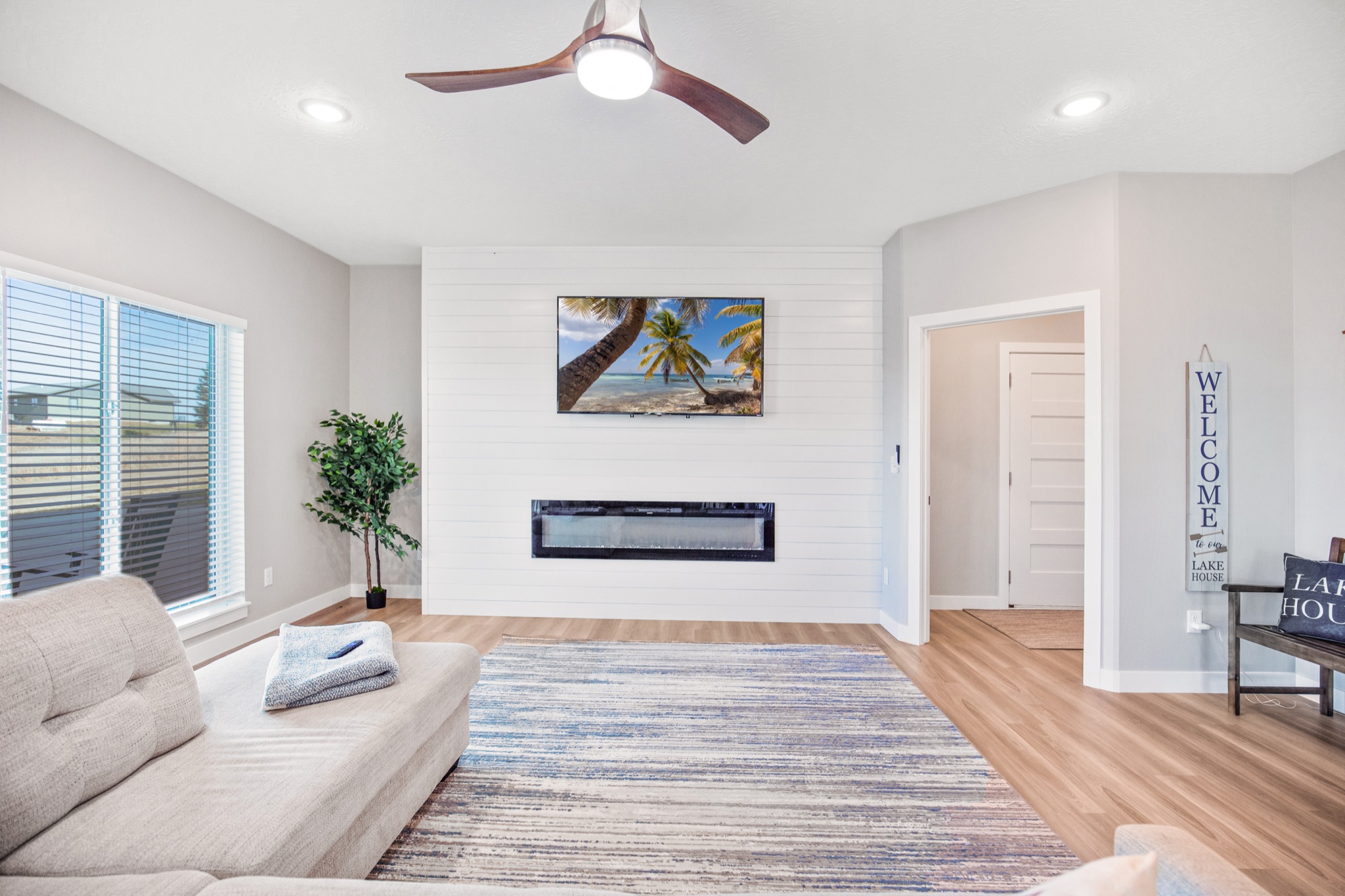 Main-level living room with linear fireplace